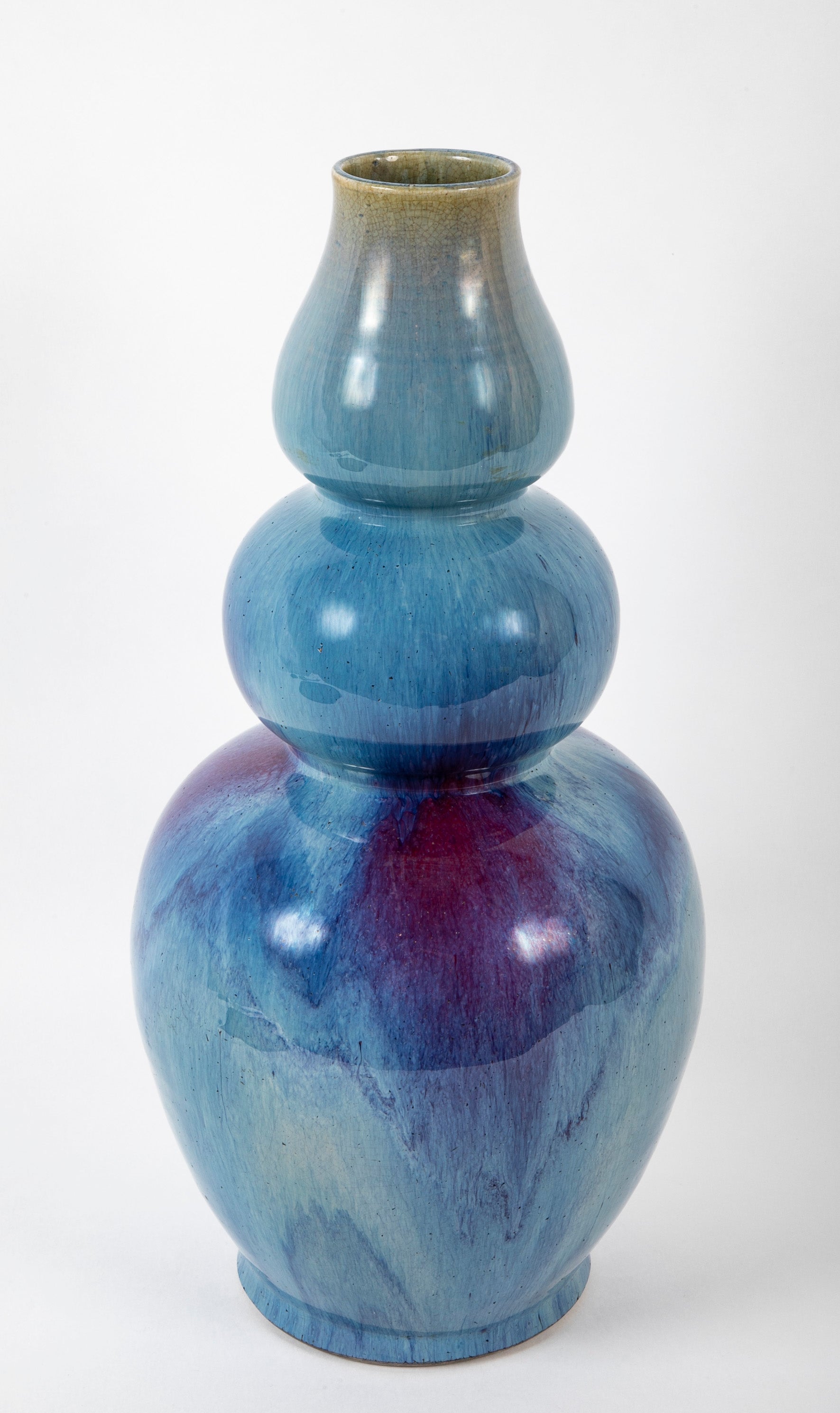 A Chinese Flambe Triple Gourd Porcelain Vase