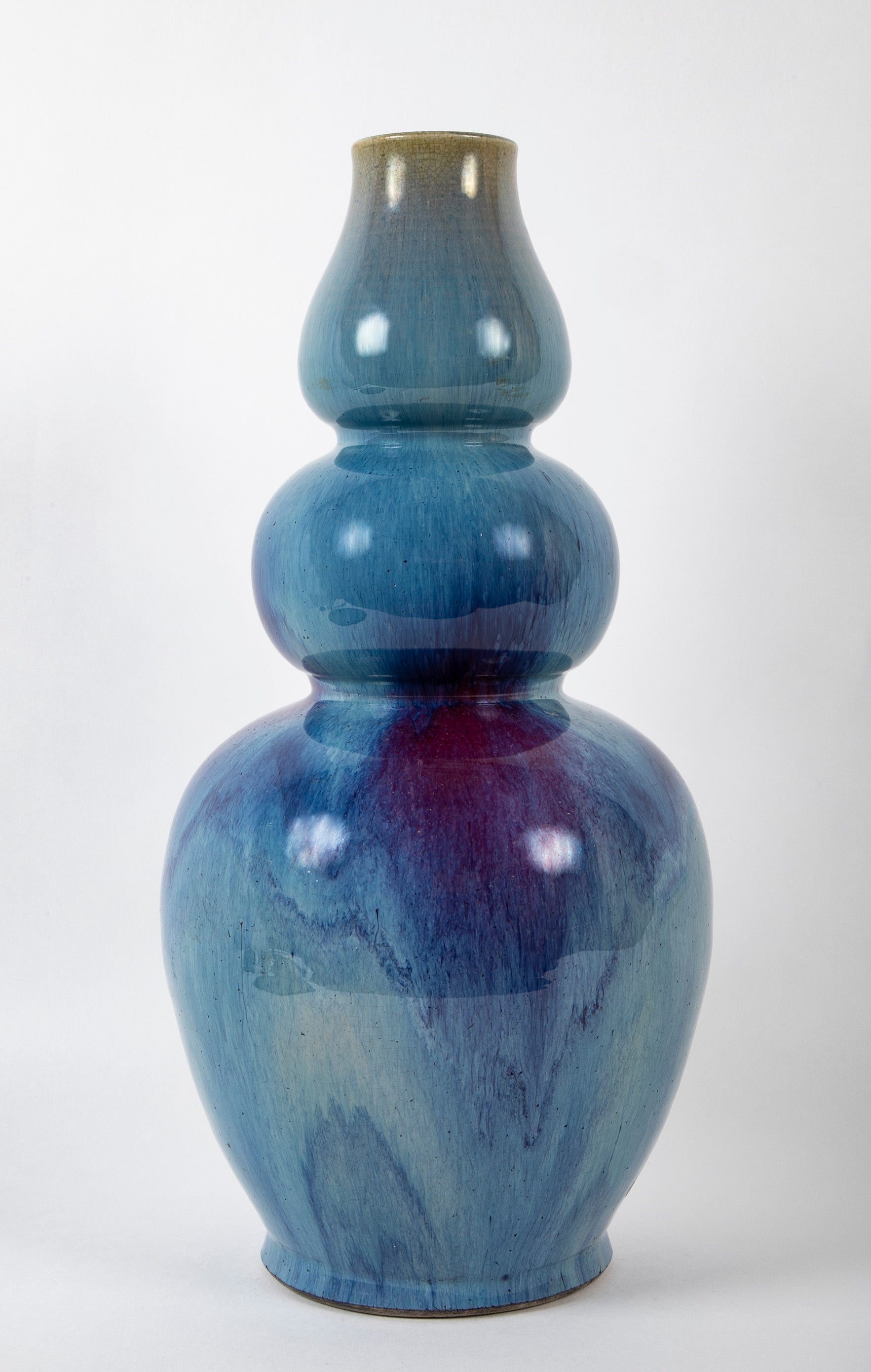 A Chinese Flambe Triple Gourd Porcelain Vase