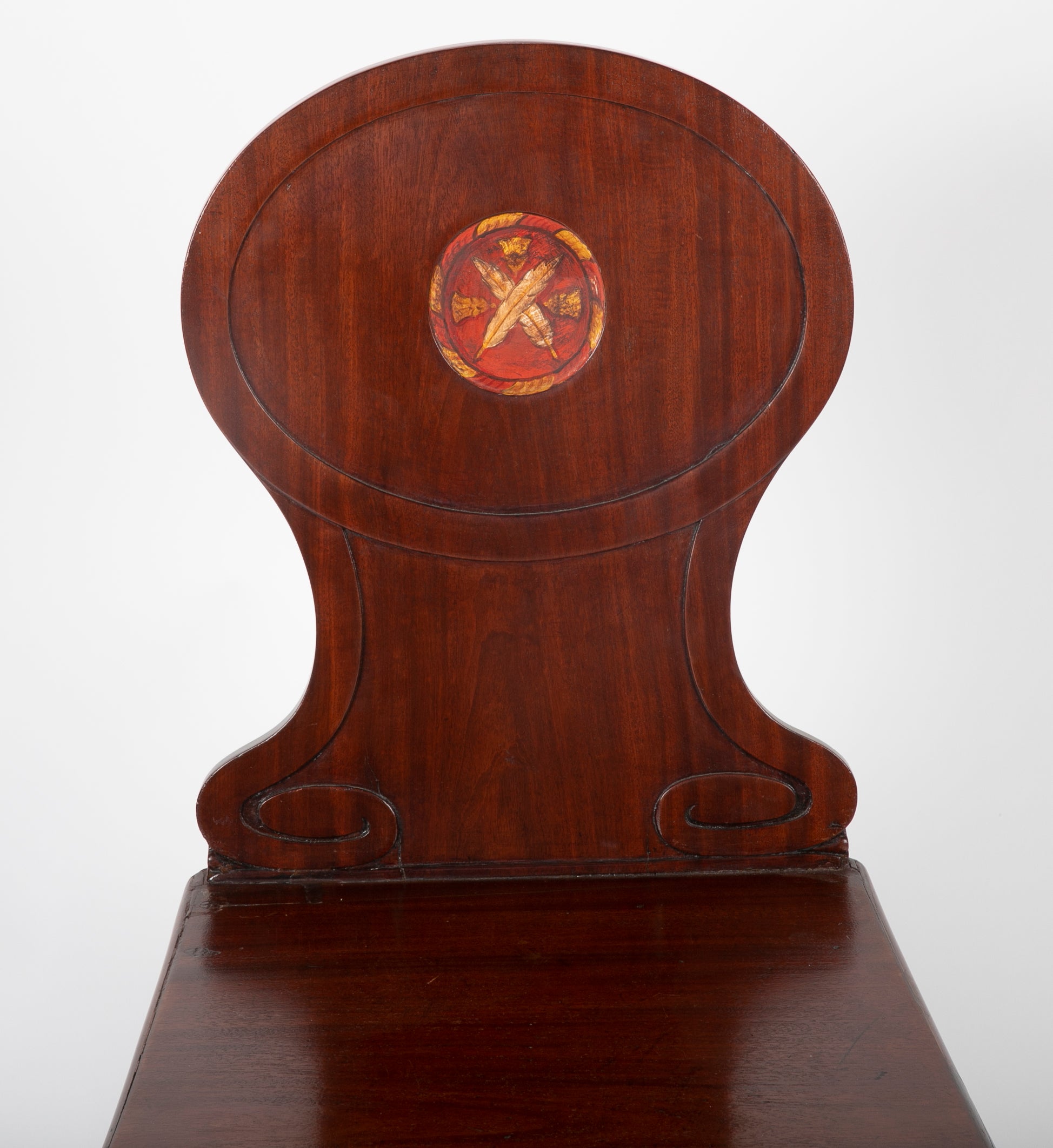A Pair of Late Georgian Mahogany and Polychrome Hall Chairs