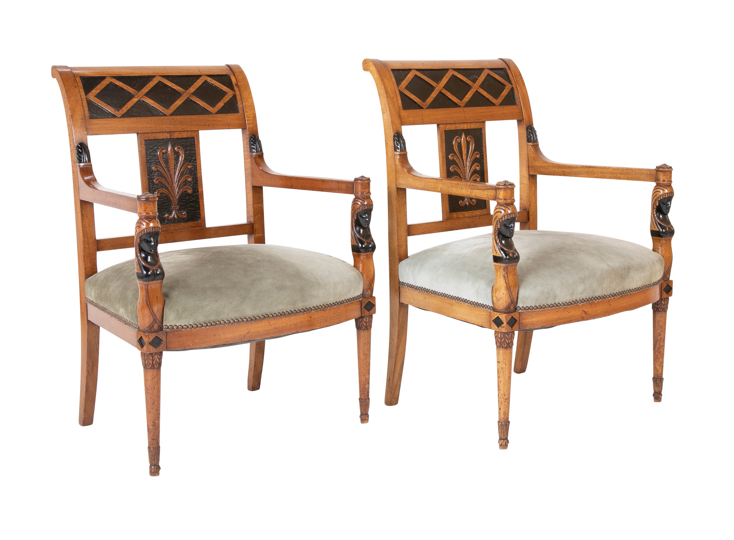 A Pair of Continental Neoclassical Chairs with Carved Egyptian Head on the Arm