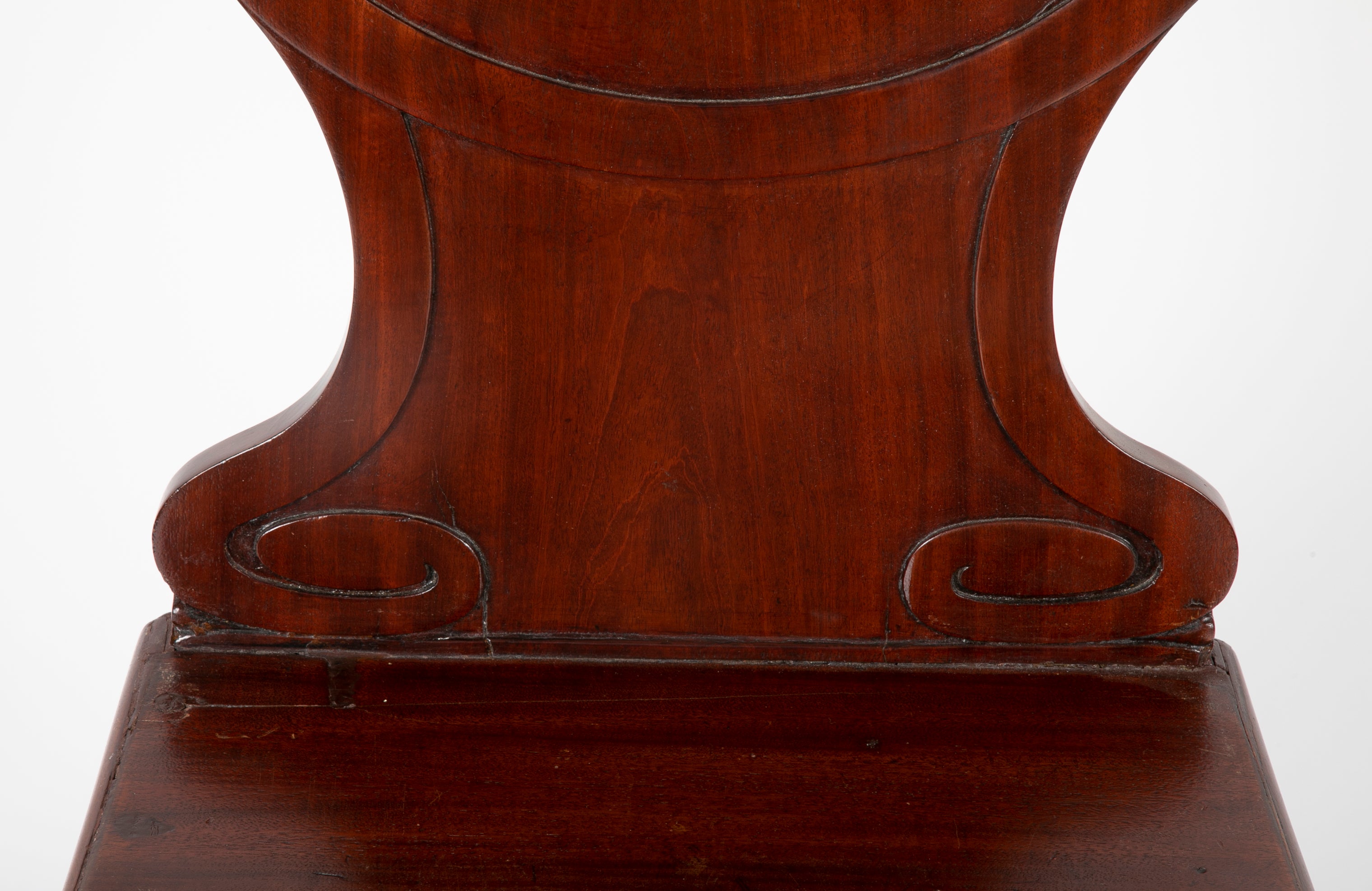 A Pair of Late Georgian Mahogany and Polychrome Hall Chairs