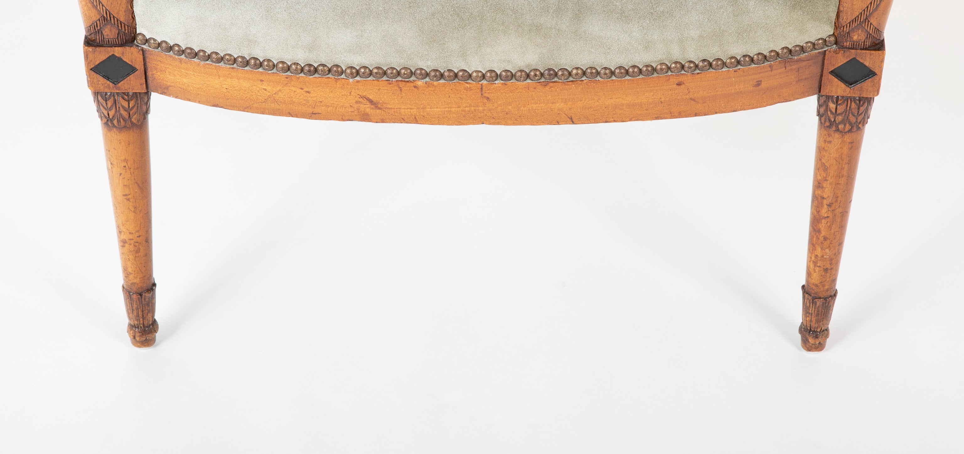 A Pair of Continental Neoclassical Chairs with Carved Egyptian Head on the Arm