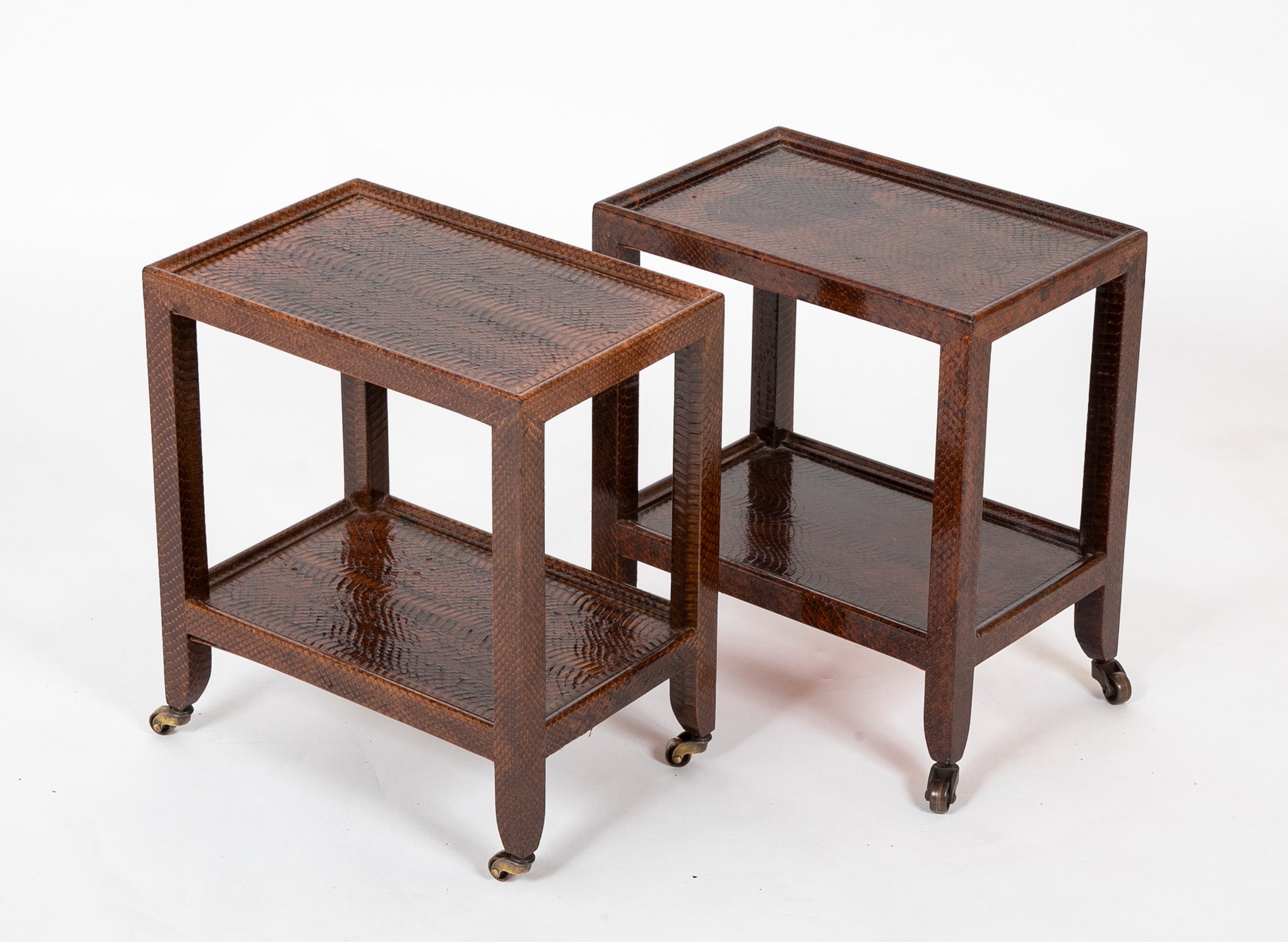 Pair of Karl Springer Snake Skin Two Tier Side Tables on Brass Casters