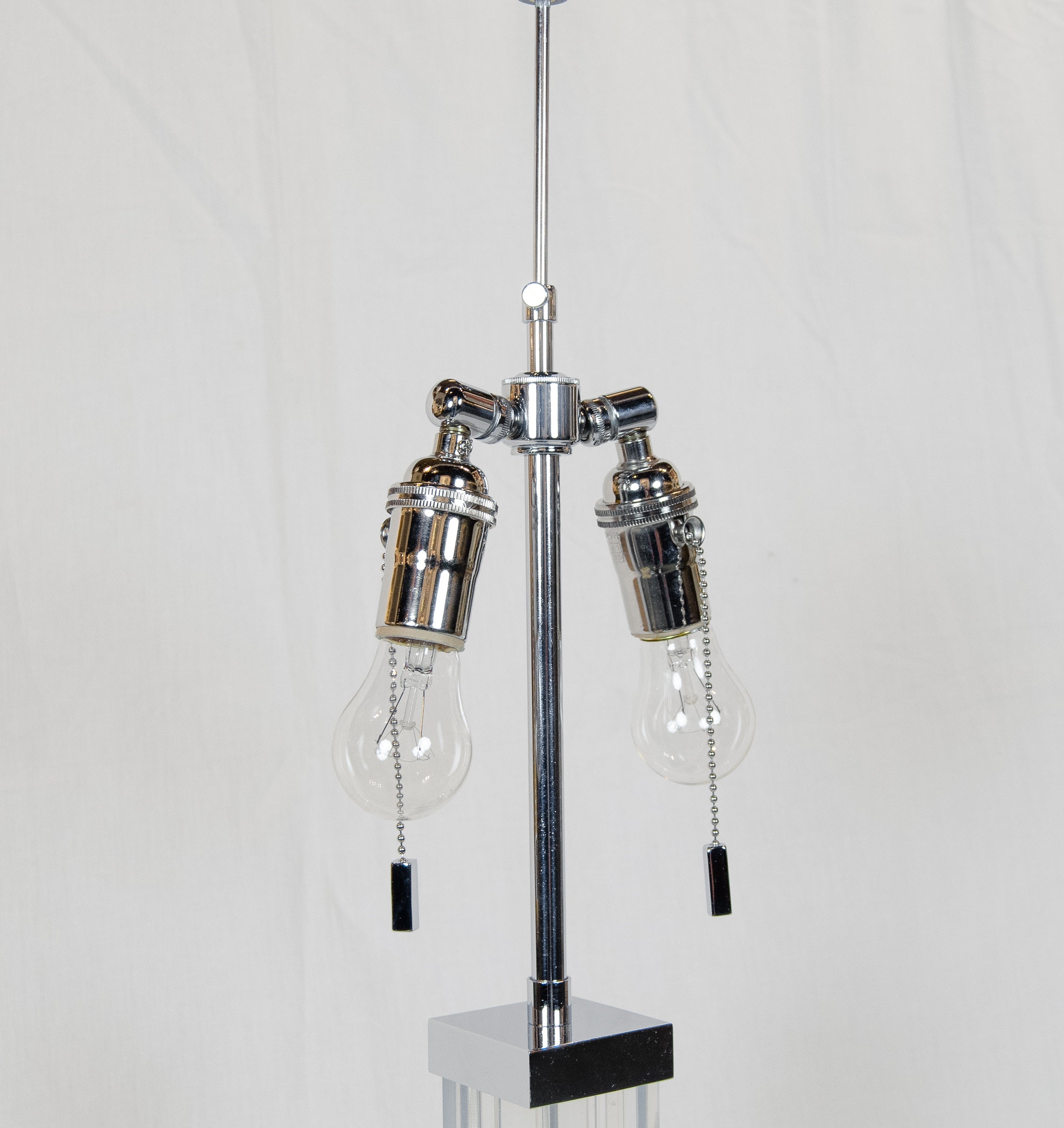 A Pair of Karl Springer Lucite and Chrome Table Lamps