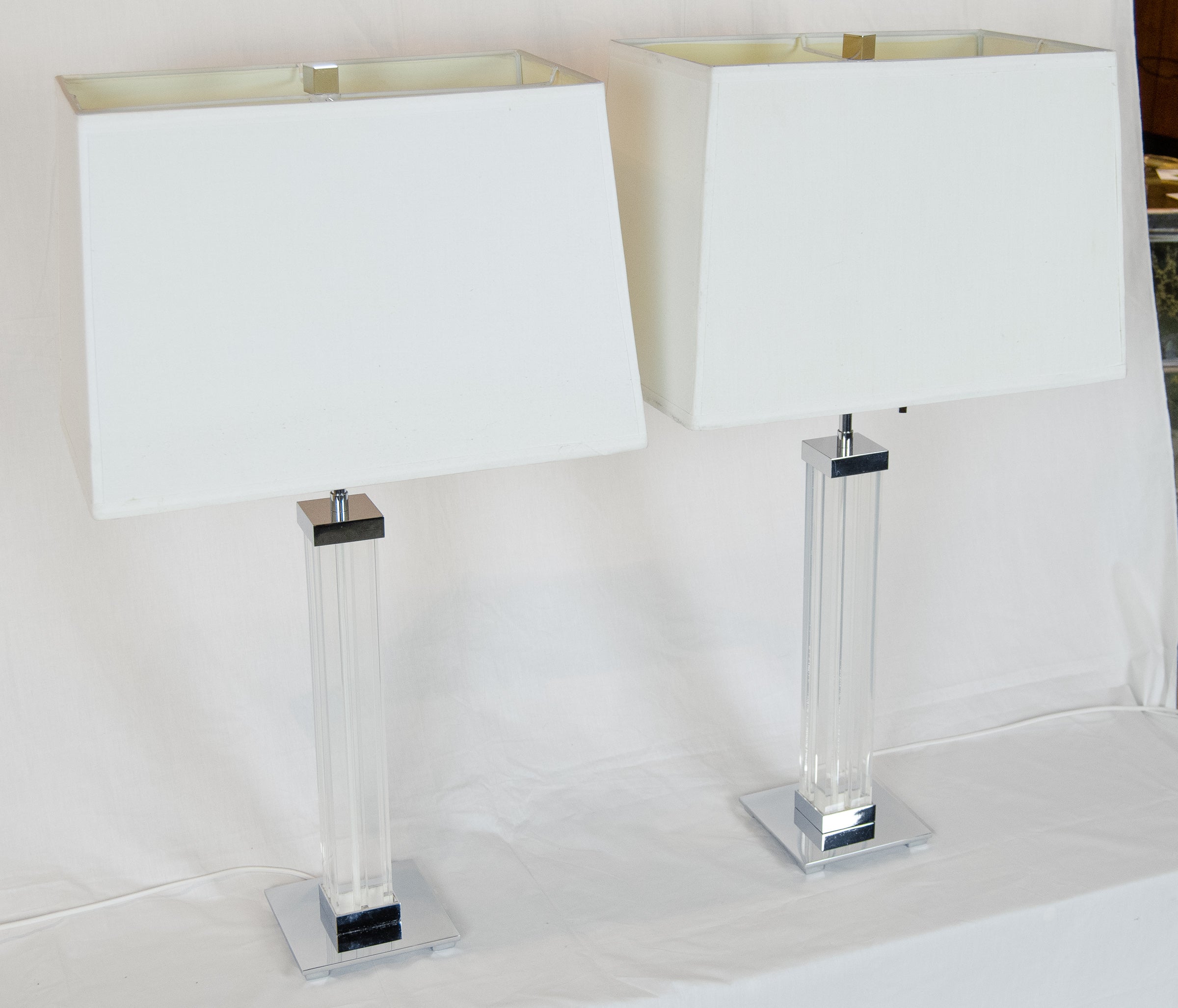A Pair of Karl Springer Lucite and Chrome Table Lamps