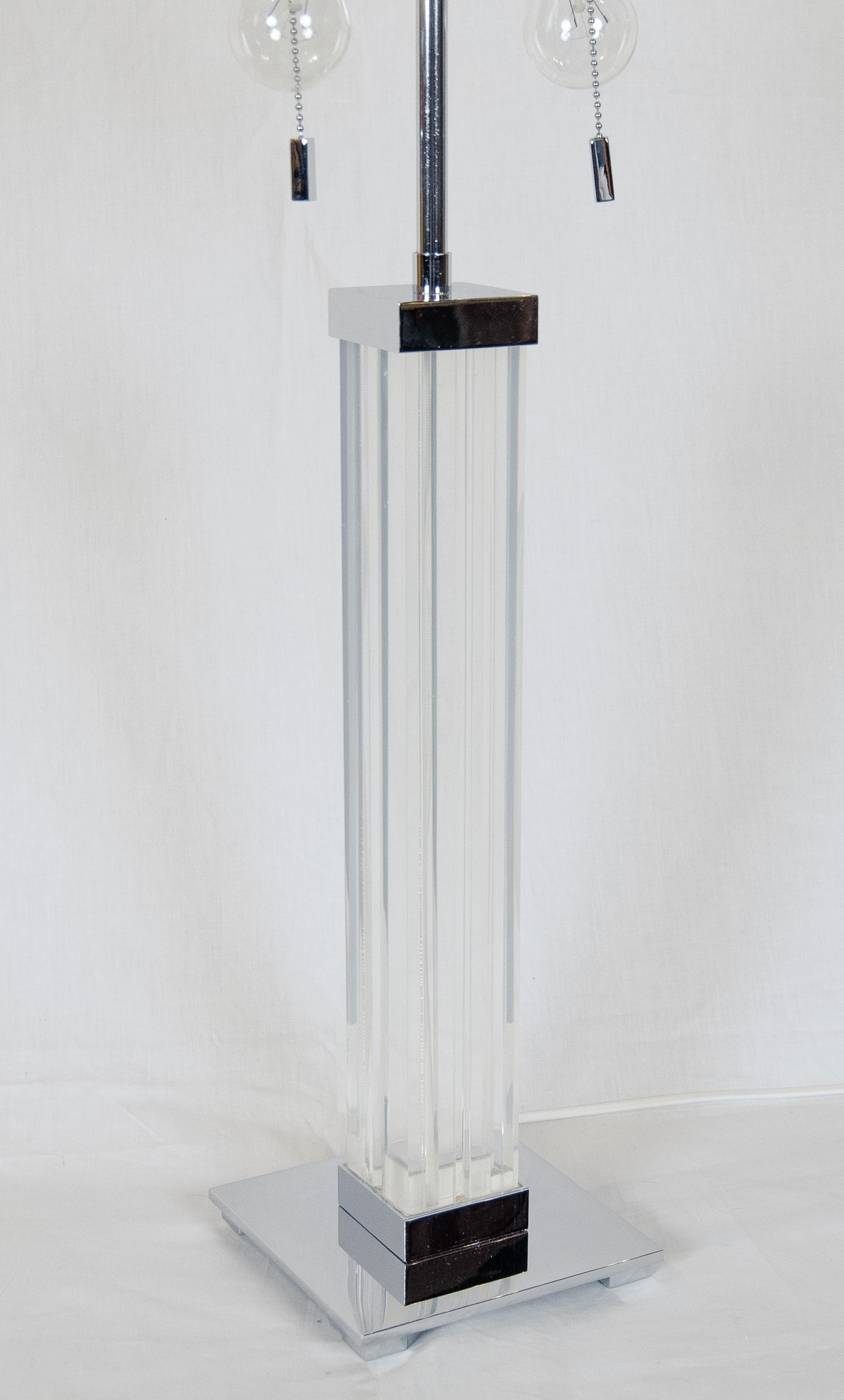 A Pair of Karl Springer Lucite and Chrome Table Lamps