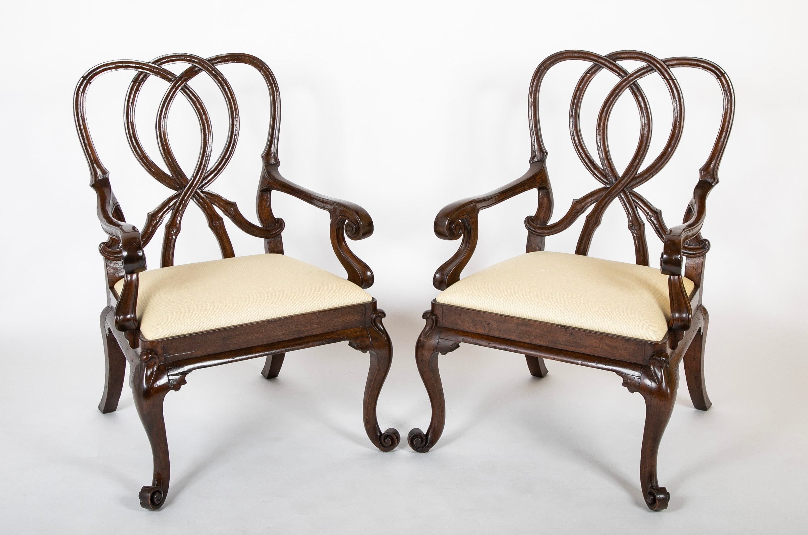A Pair of Venetian Rococo Style Walnut Armchairs