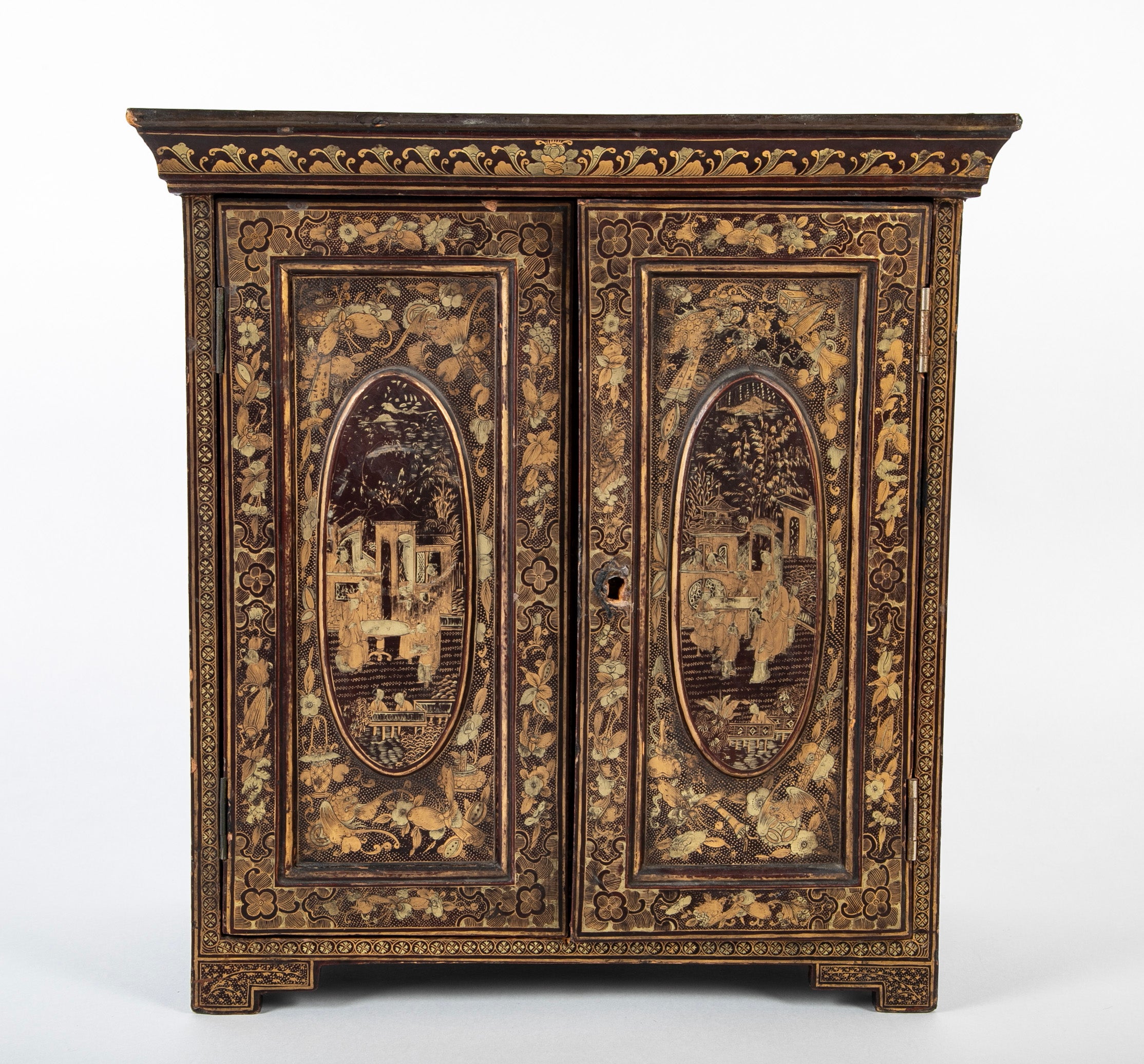 A Chinese Two Door Black Lacquered Table Top Chest