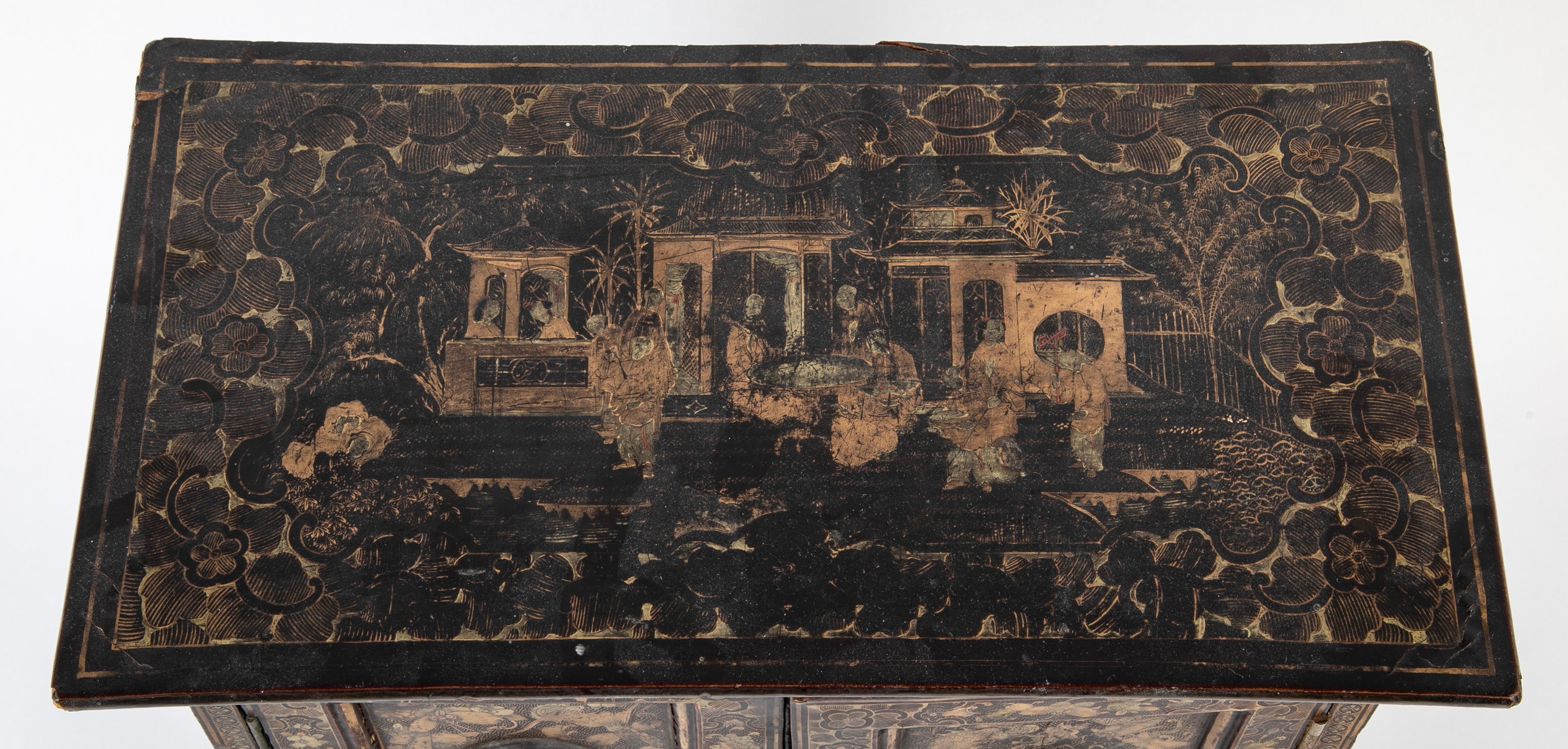 A Chinese Two Door Black Lacquered Table Top Chest
