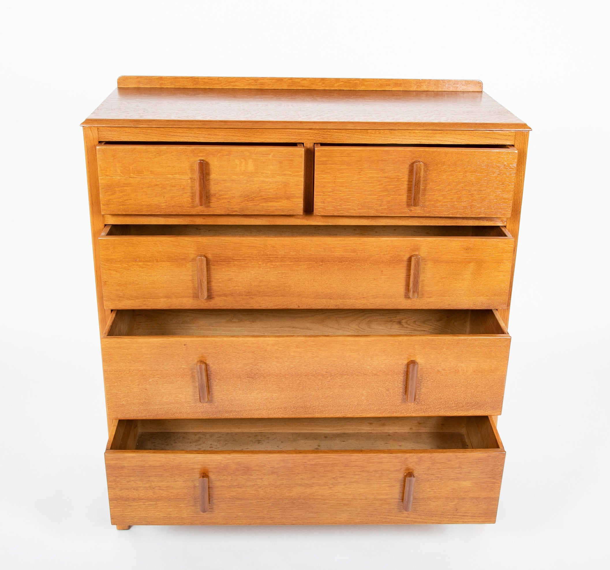 Pair of English Cotswold School Limed Oak Five Drawer Chests