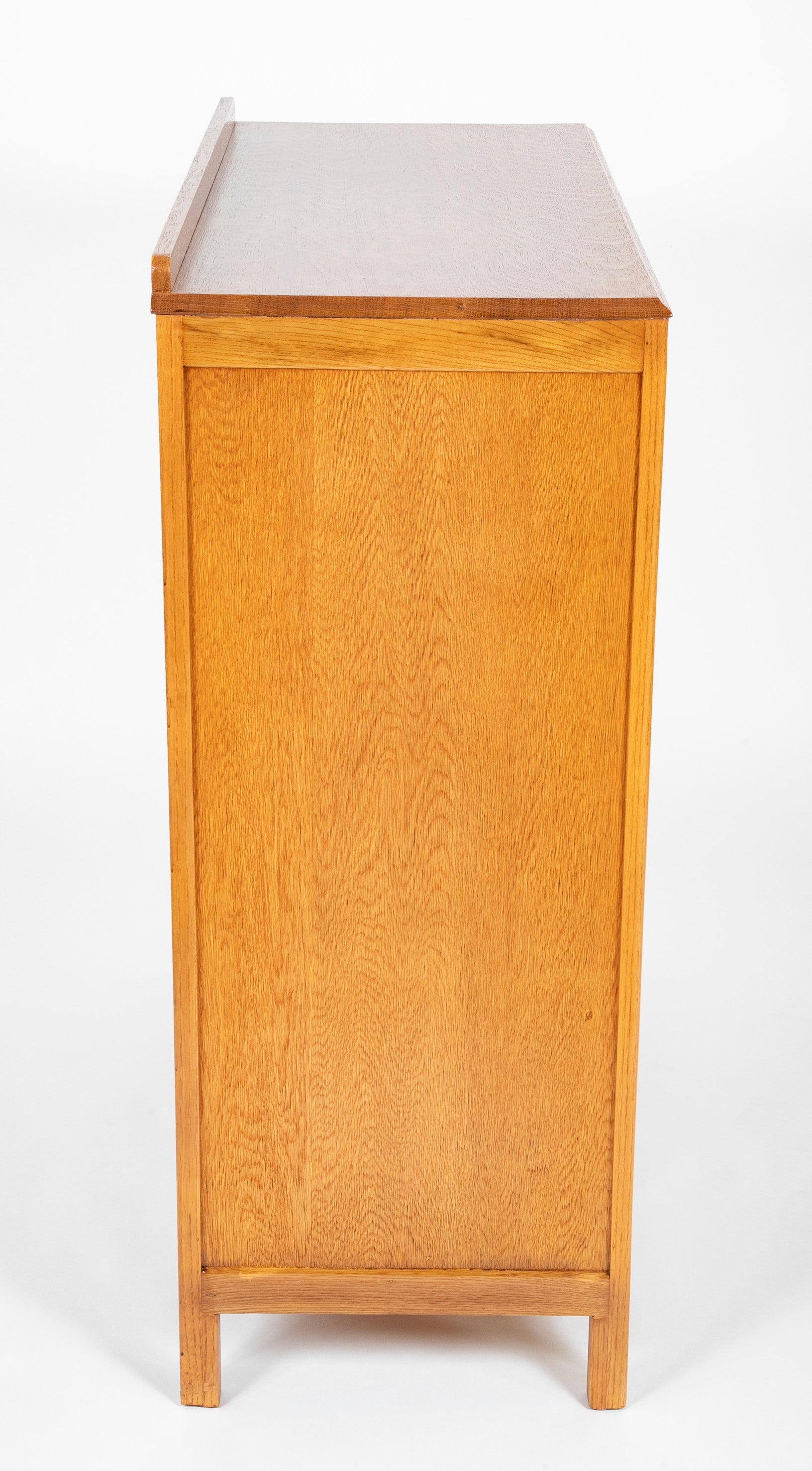 Pair of English Cotswold School Limed Oak Five Drawer Chests