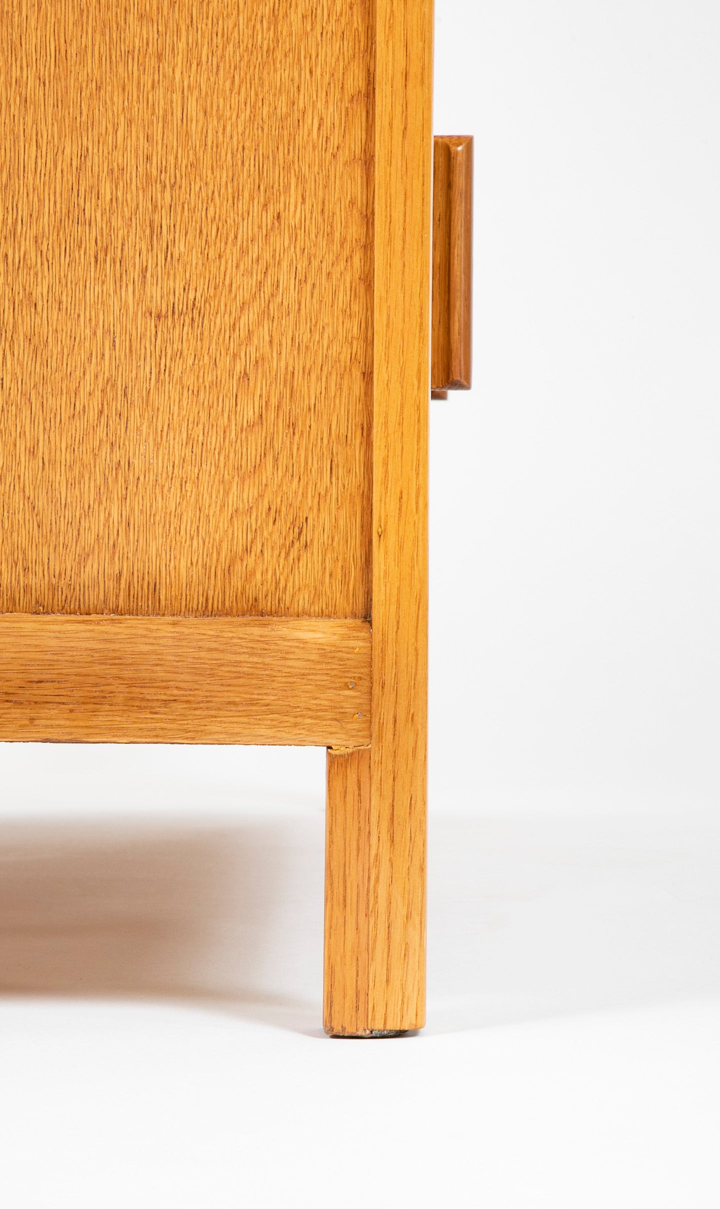 Pair of English Cotswold School Limed Oak Five Drawer Chests