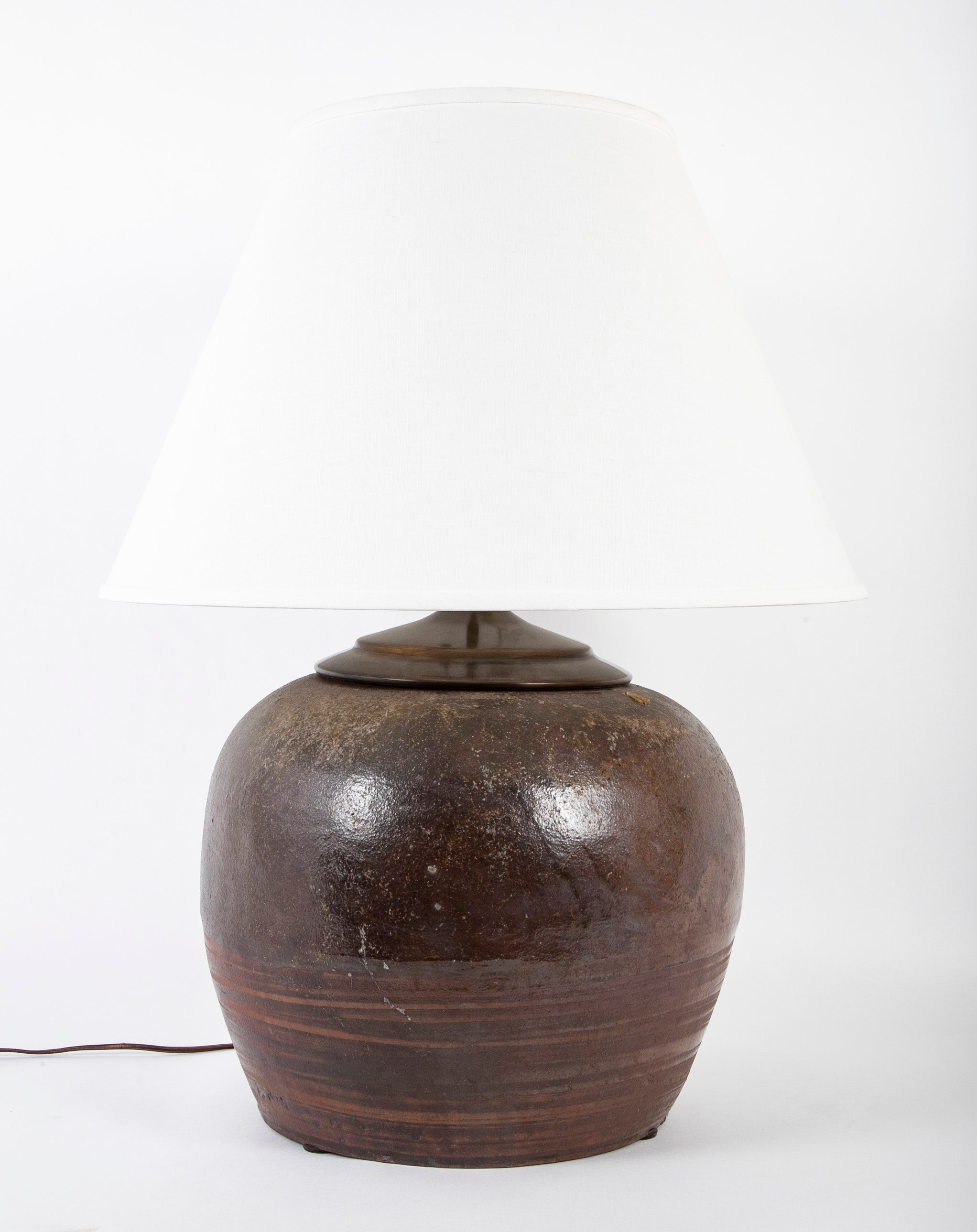Two Bronze Glazed Ceramic Lamps