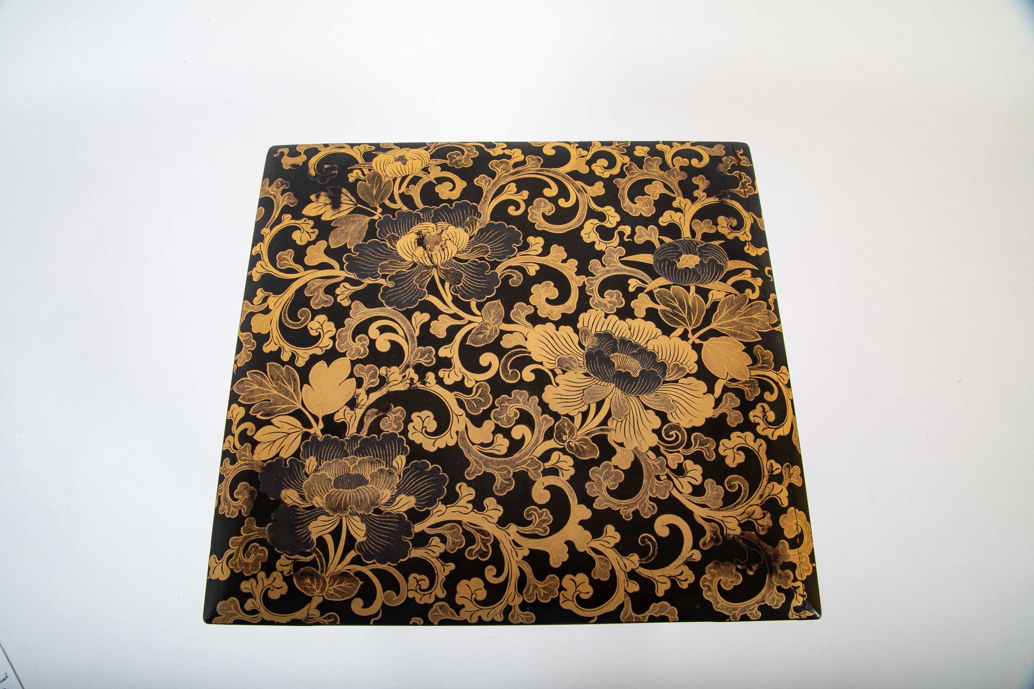 A Japanese Black Lacquer 4 Tier Bento Box with Gilt Floral Designs