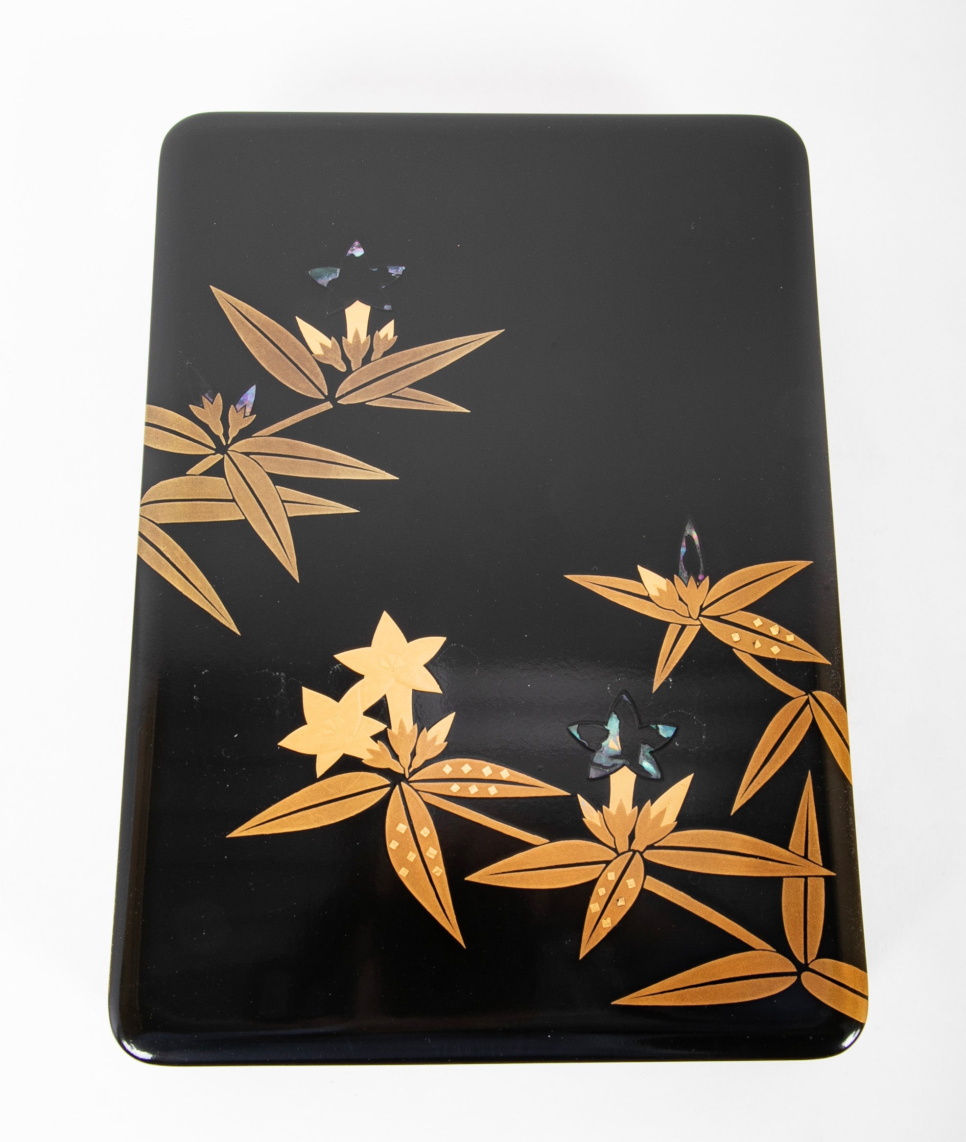 A Wajima Lacquered Covered Box with Gilt Leaf Decoration