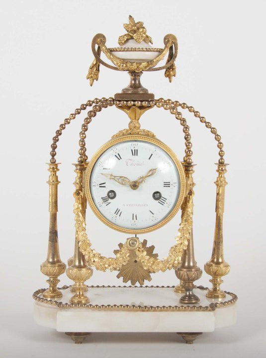 An 18th Century Gilt Bronze French Portico Clock