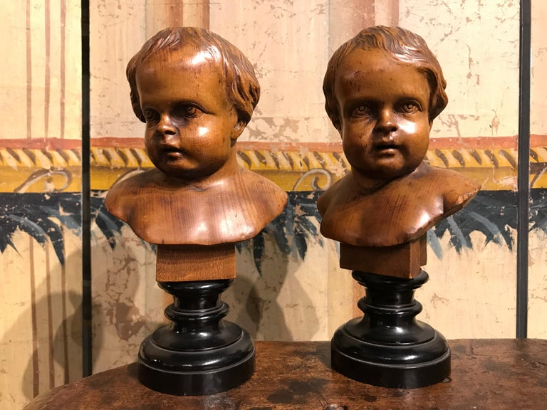 Pair of South German Carved Wood Busts of Putti