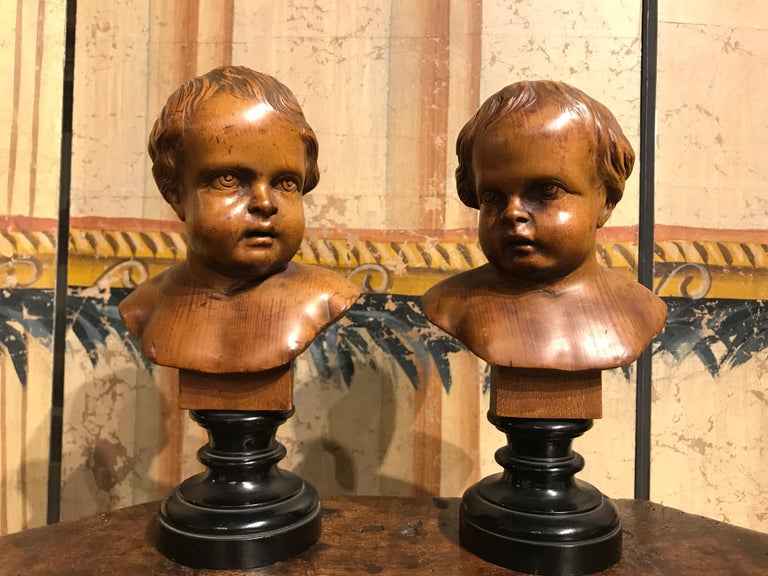 Pair of South German Carved Wood Busts of Putti