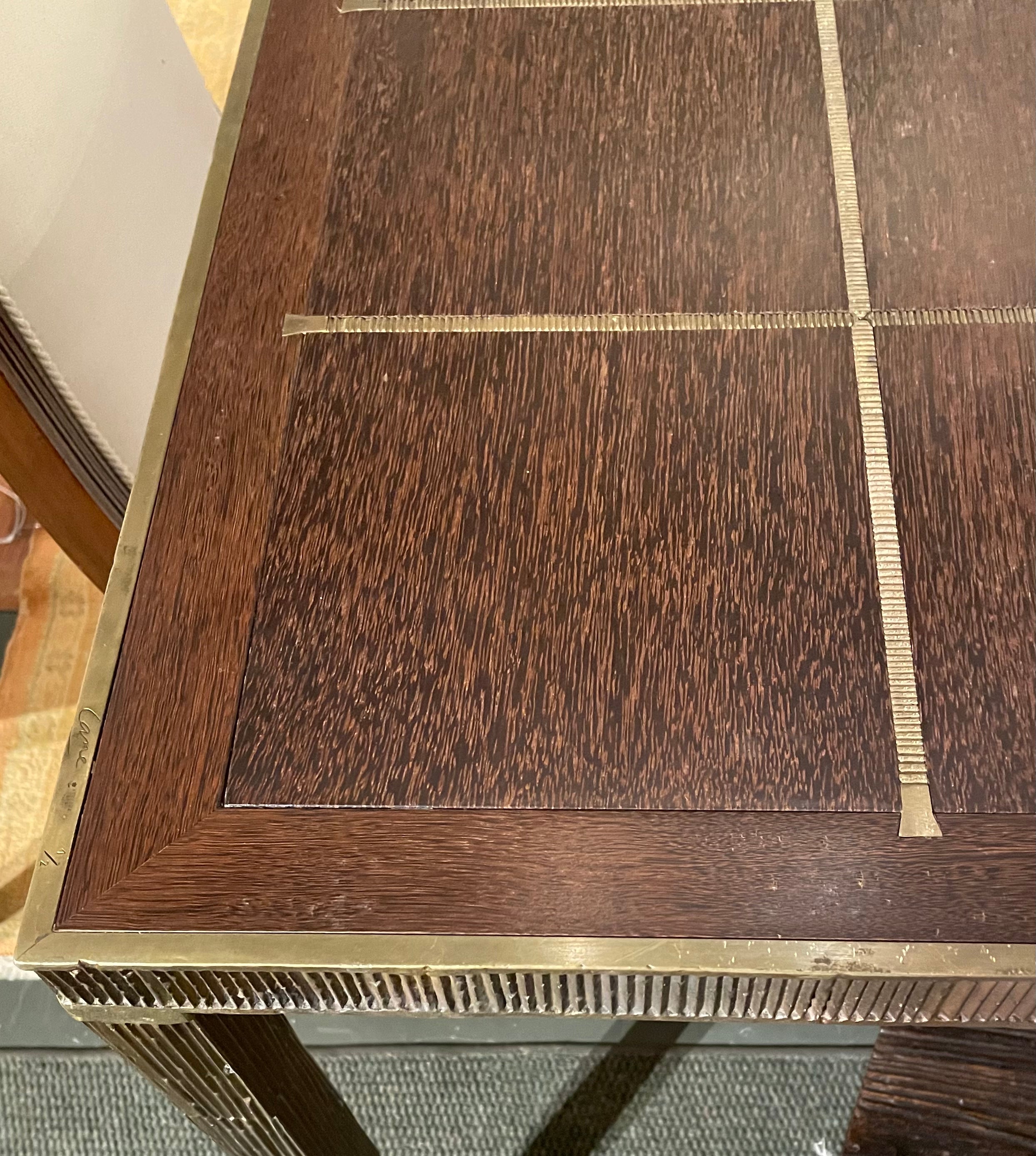 A Palmwood and Bronze Table by Louis Cane