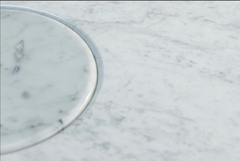A Carrara Marble Table Designed by Angelo Mangiarotti produced by Skipper