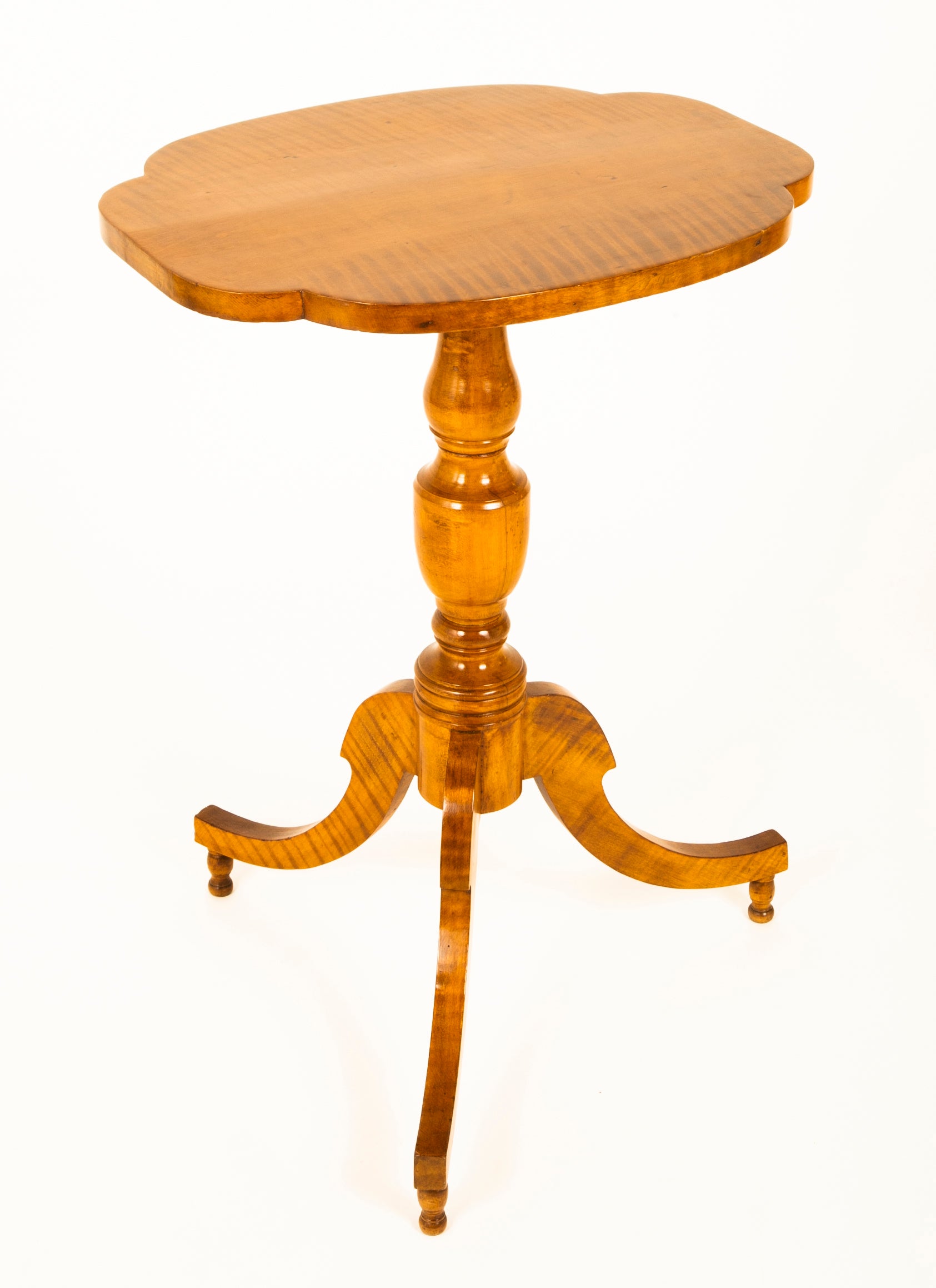An American Stylized Quatrefoil Tiger Maple Table