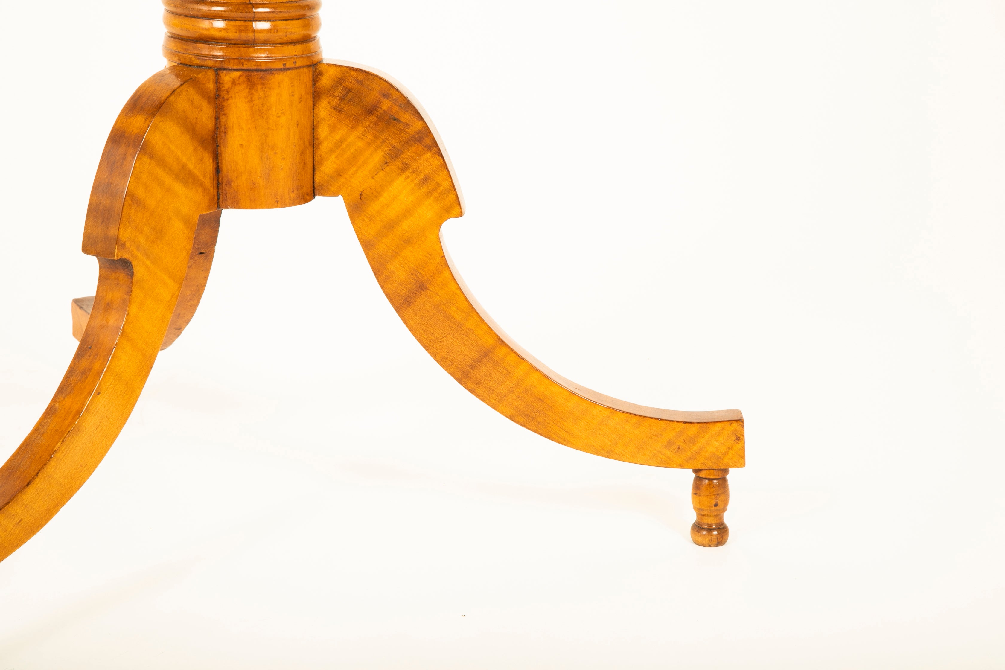 An American Stylized Quatrefoil Tiger Maple Table