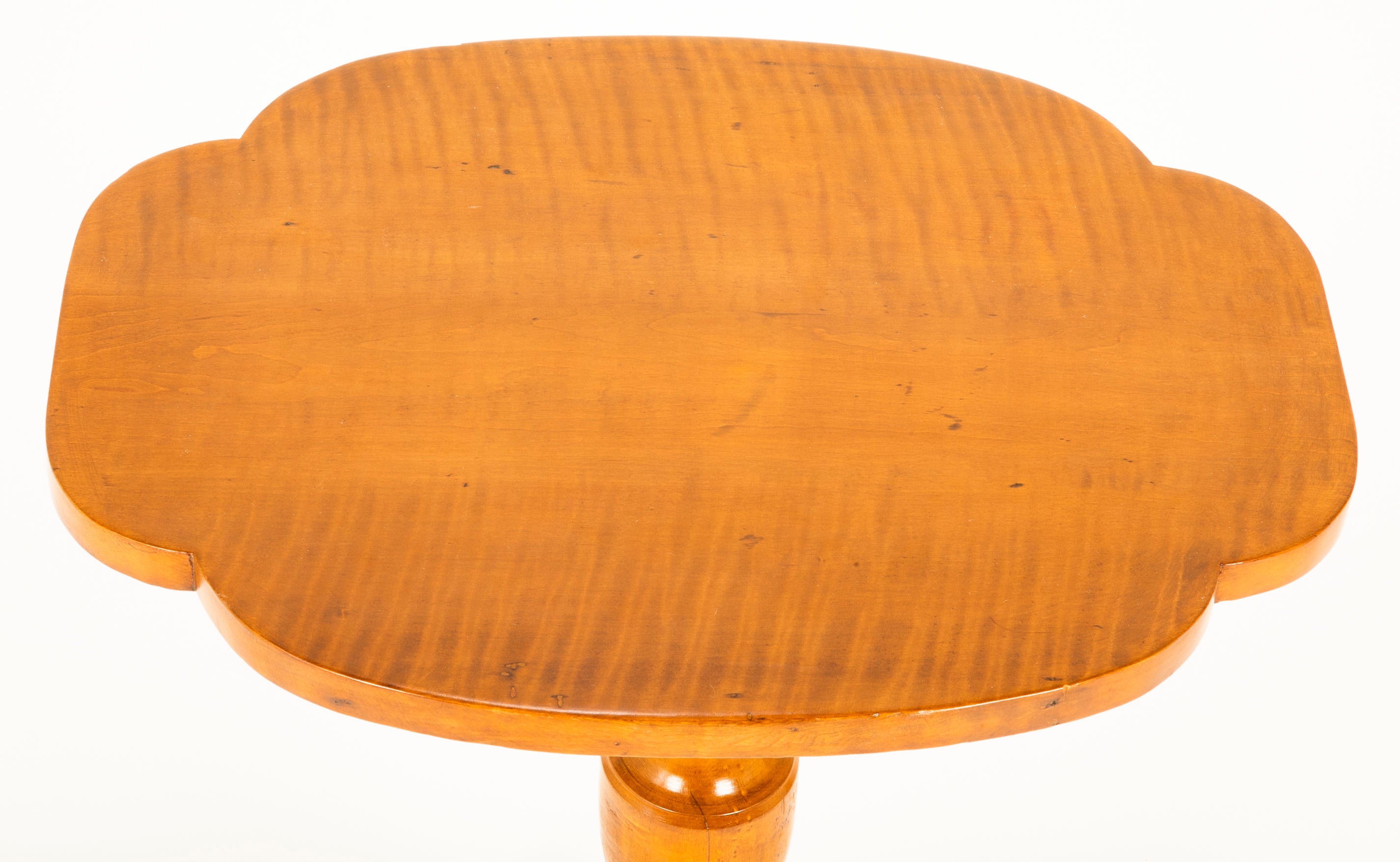 An American Stylized Quatrefoil Tiger Maple Table
