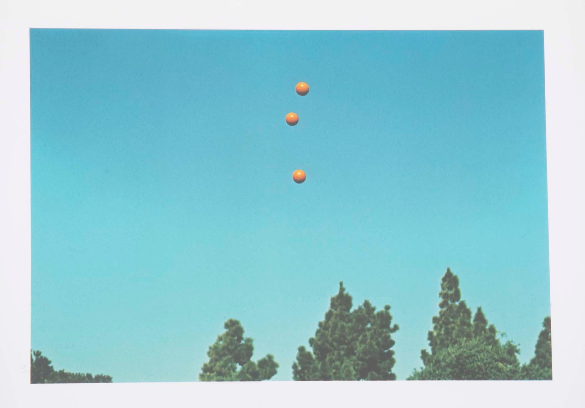 John Baldessari "Throwing Three Balls in the Air to get a Straight Line" , 1973