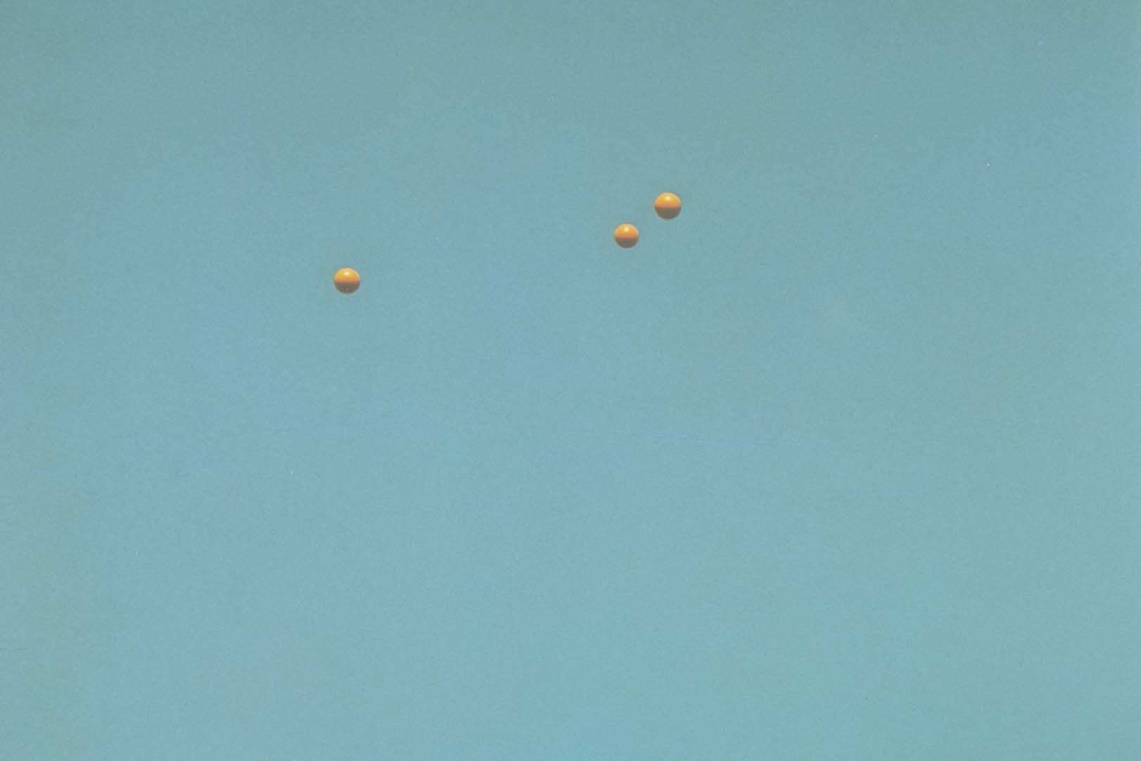 John Baldessari "Throwing Three Balls in the Air to get a Straight Line" , 1973