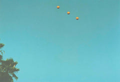 John Baldessari "Throwing Three Balls in the Air to get a Straight Line" , 1973