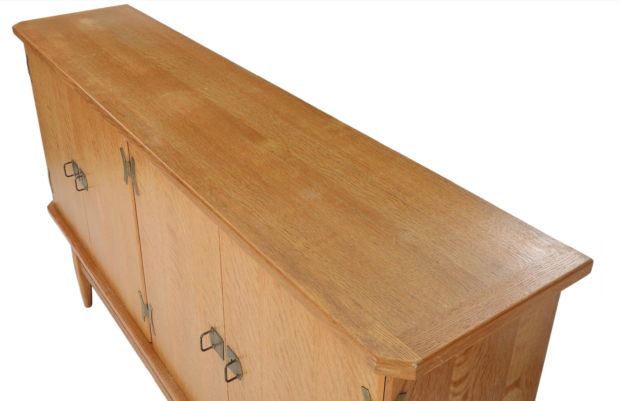 A Four Door Oak Sideboard with Brass Fittings By Henry Kjærnulf