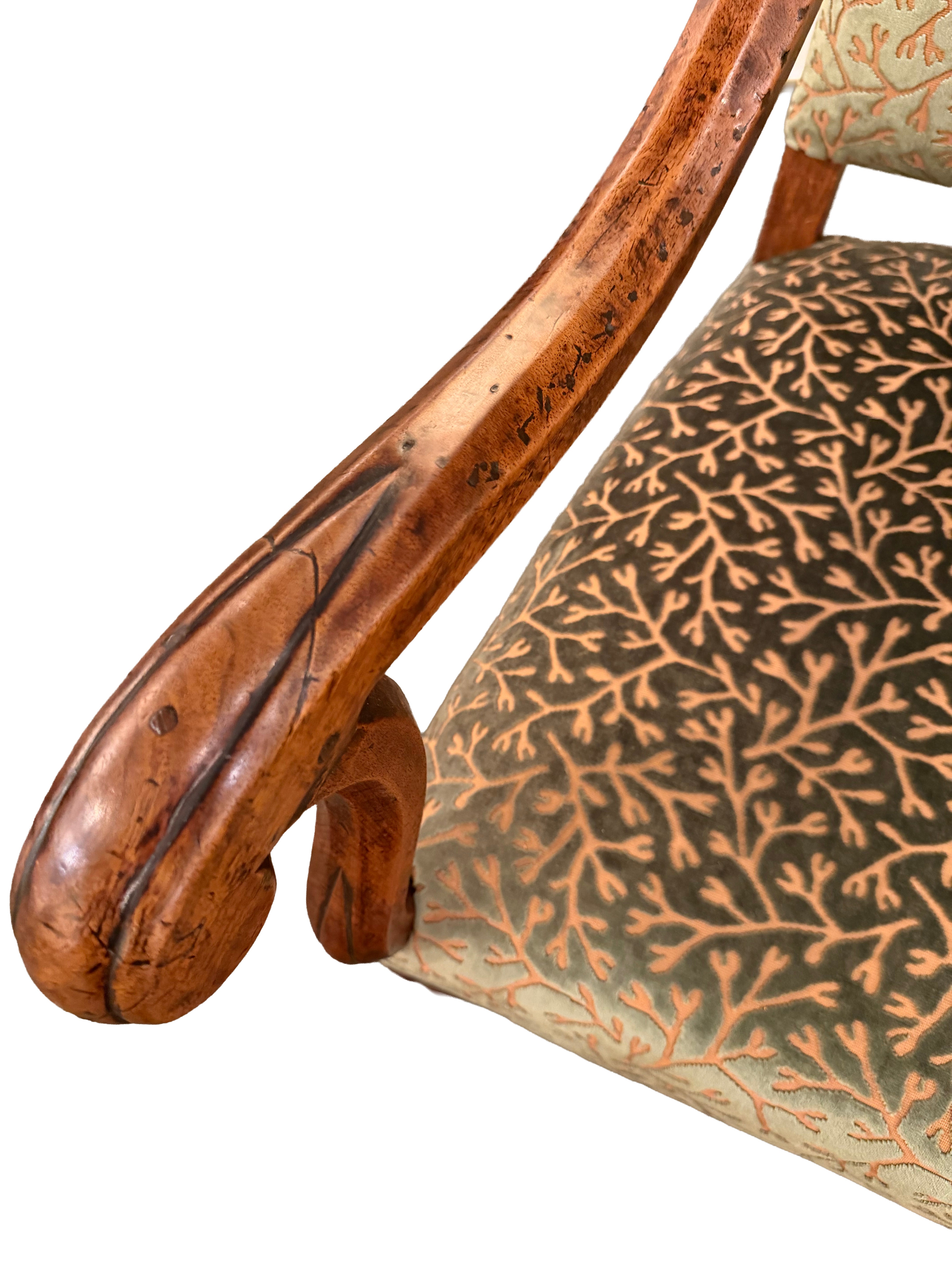 A Sculpted Walnut Louis XIII Bergere with Cut Velvet Upholstery