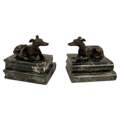Pair of Regency Bronze Figures of Reclining Whippets on Green Marble Bases