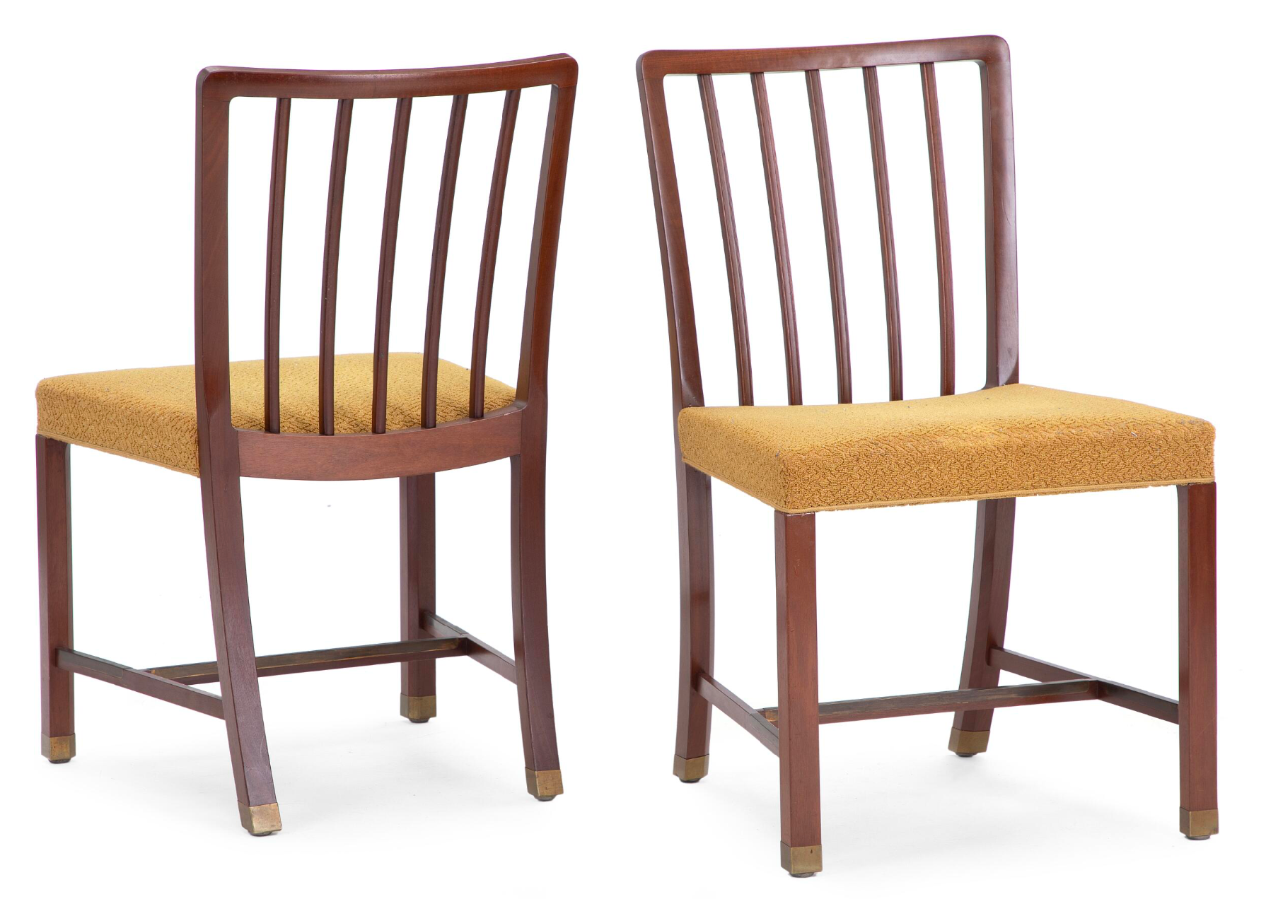 A Set of Eight Danish Mahogany and Brass Dining Chairs