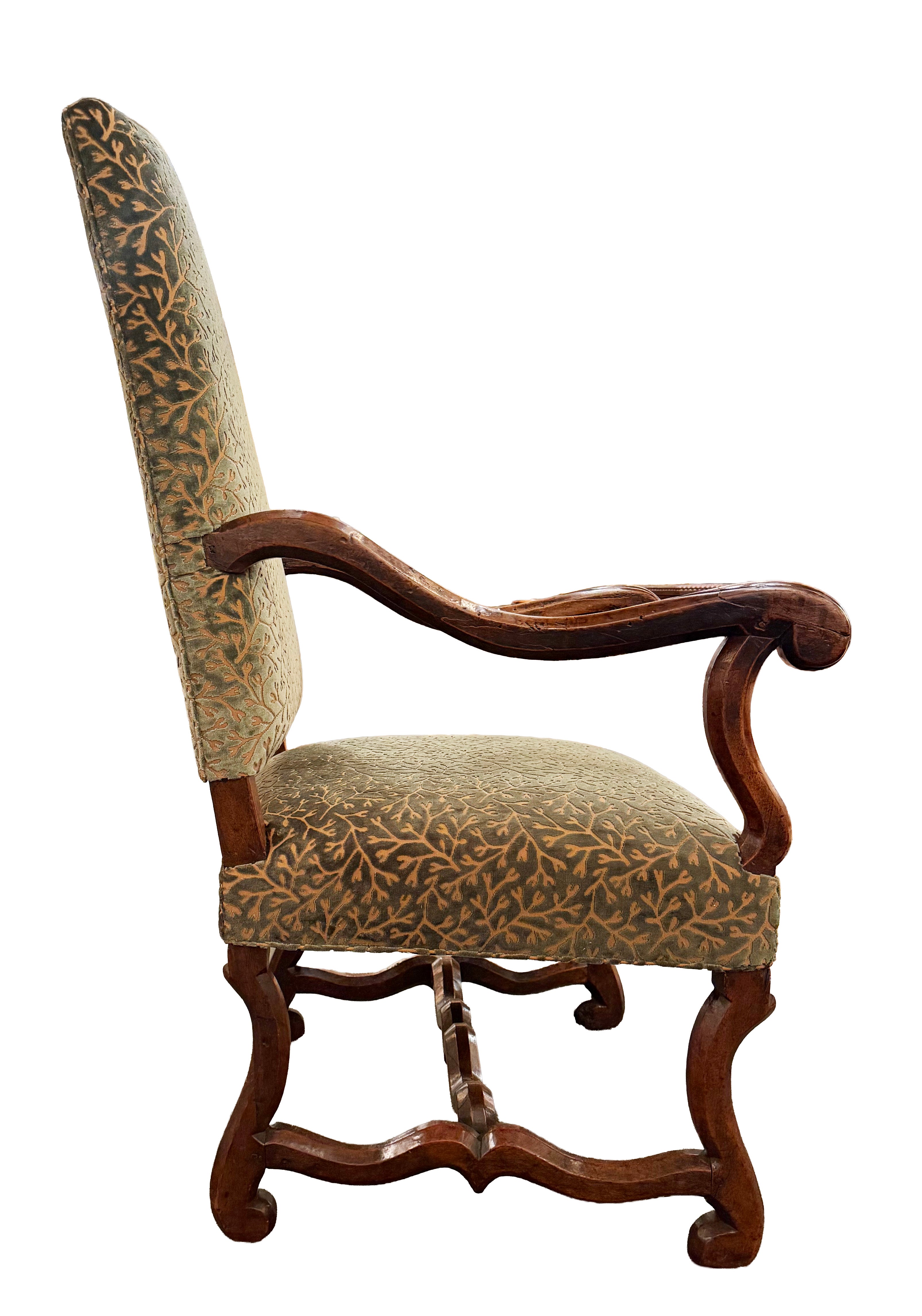 A Sculpted Walnut Louis XIII Bergere with Cut Velvet Upholstery