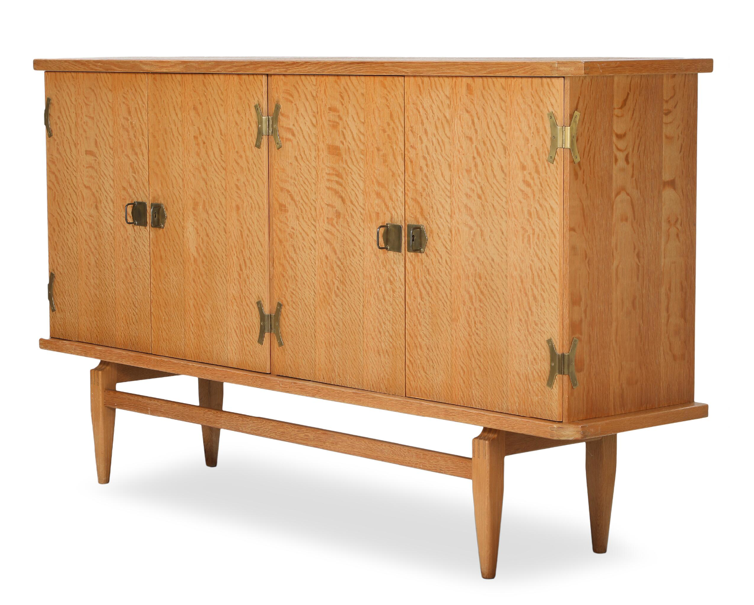 A Four Door Oak Sideboard with Brass Fittings By Henry Kjærnulf