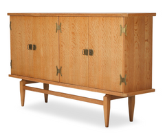 A Four Door Oak Sideboard with Brass Fittings By Henry Kjærnulf