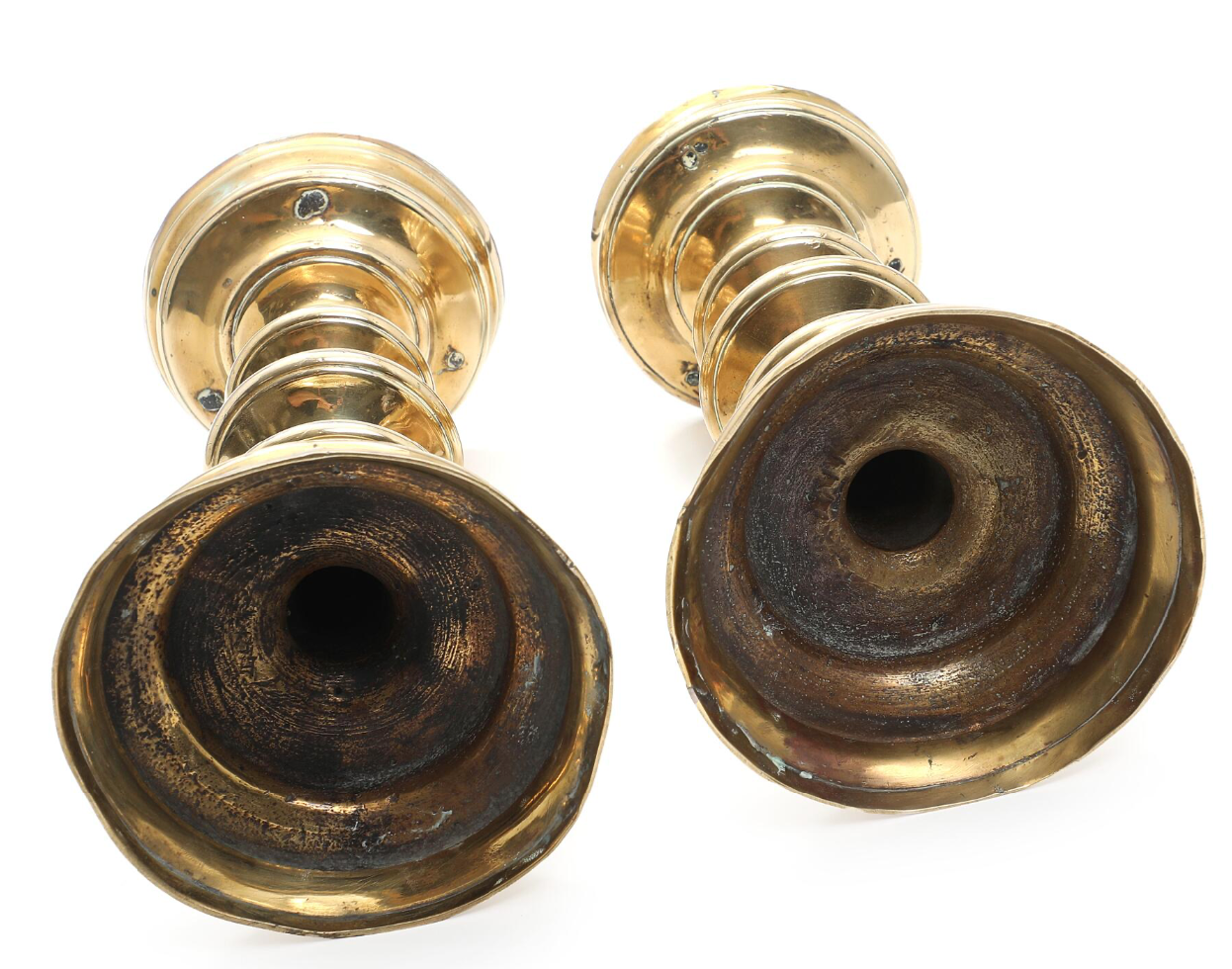 Pair of Gothic Circa 1580–1600 Patinated Brass Altar Candlestick Holders, Baluster Shaped Stem on Round Base, Presumably Friesland