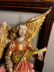 Italian Baroque Painted and Gilt Wood Winged Angel Playing a Violin