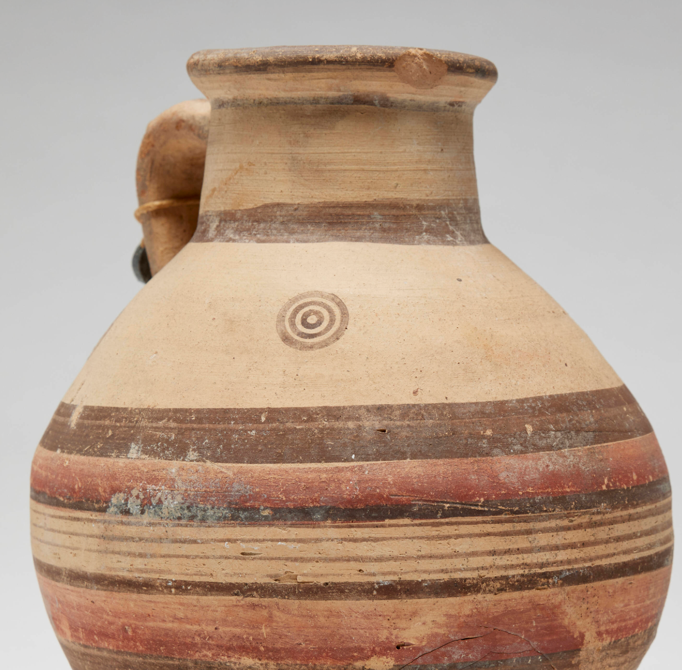 Cypriot Slip-Glazed Terracotta Wine Jug, Bichrome Ware with Horizontal Band Decoration and Concentric Circle Motifs