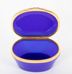 An Oval Mid 20th Century Blue Opaline Glass Box