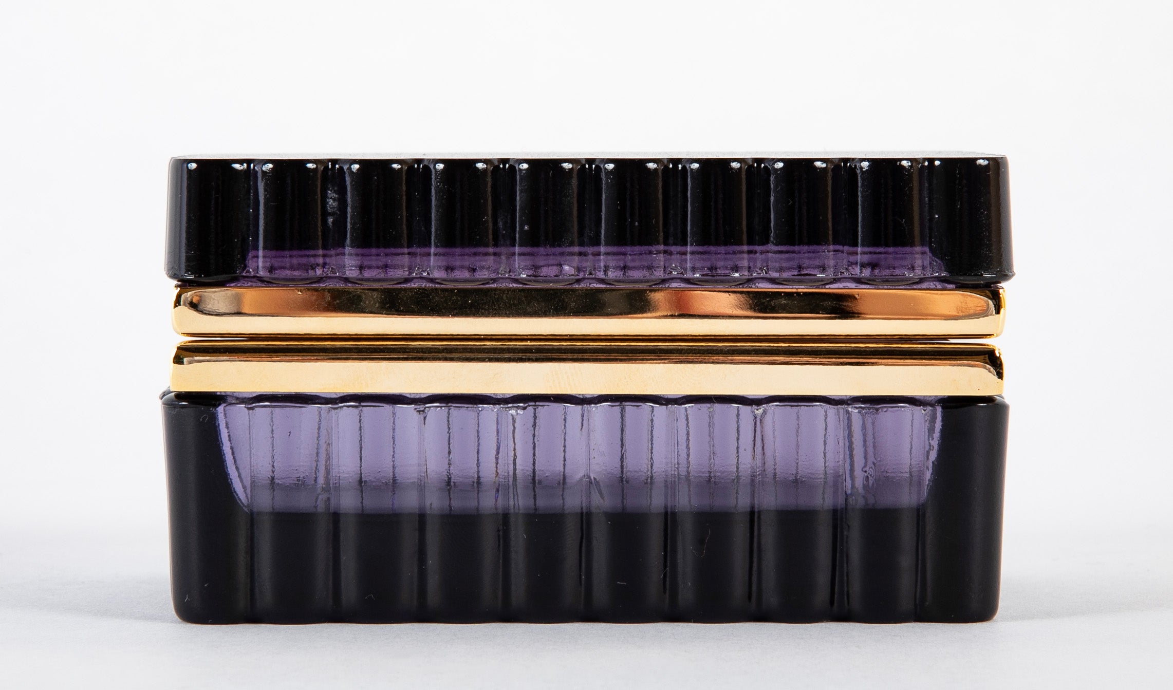 An Amethyst Colored Glass Box with Scalloped Edges