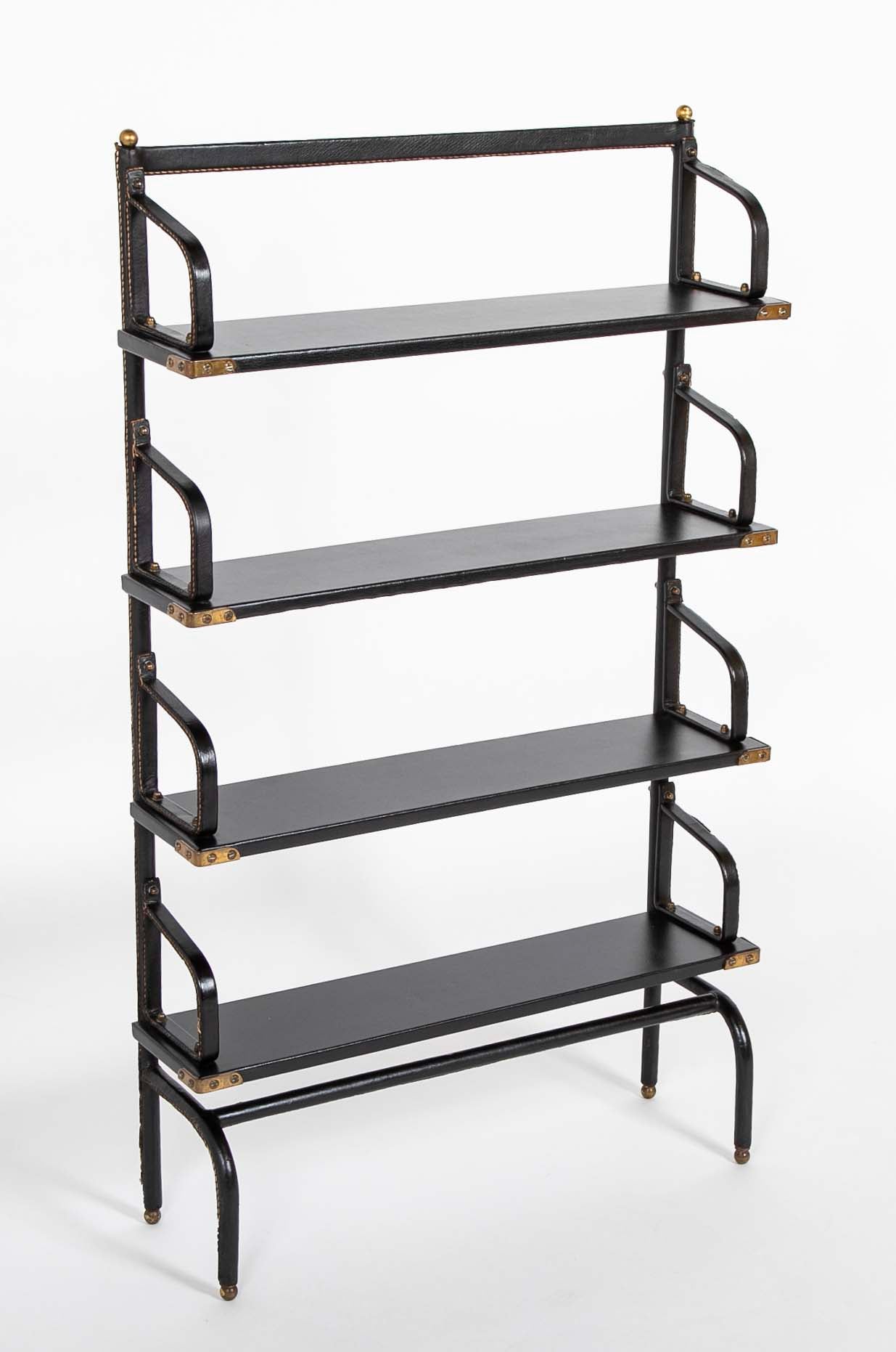 A Jacques Adnet Stitched Black Leather Covered Small Bookcase