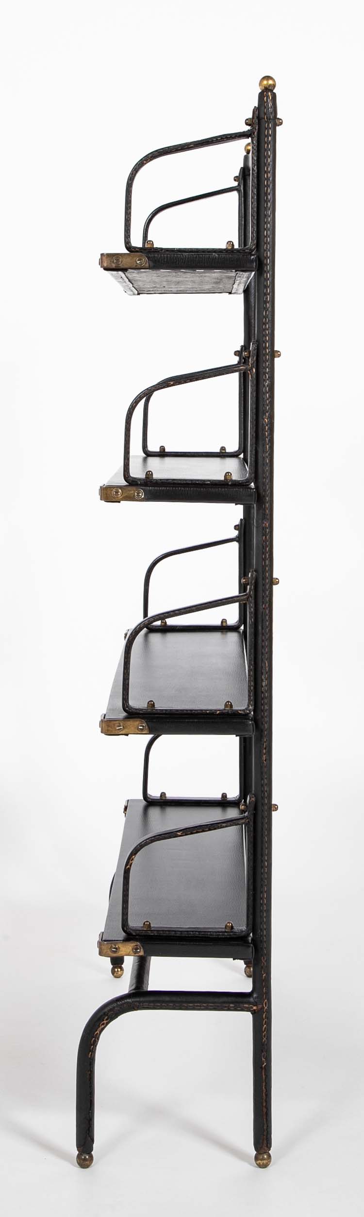A Jacques Adnet Stitched Black Leather Covered Small Bookcase