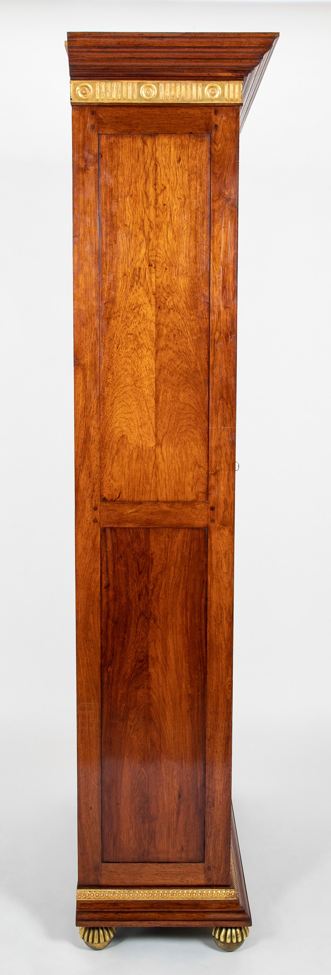 A Louis Philippe Style Walnut & Parcel Gilt Cabinet