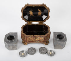 A Chinese Export Lacquered Tea Caddy with Pewter Fitted Interior