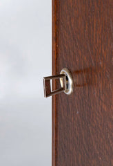 An Oak and Aluminum Cabinet by Rene Gabriel