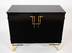 A Maison Jansen Black Lacquer Cabinet with Gilded Brass Accents