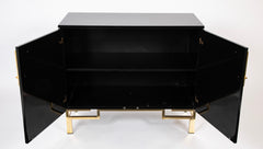 A Maison Jansen Black Lacquer Cabinet with Gilded Brass Accents
