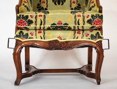 A Grand Scale French Louis XV Period Carved Walnut Armchair